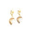 Presenting the Heart Shaped Zirconia Stones Dangle Earrings, exquisitely crafted with 14k gold filled metal. These elegant earrings showcase large, heart-shaped, clear gemstones encircled by smaller sparkling stones and suspended from intricately detailed gold hooks.